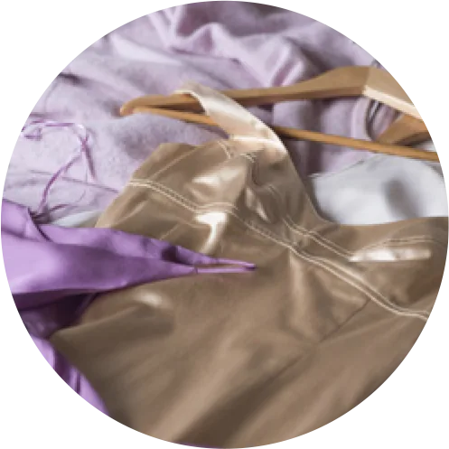 Gold and lilac silk on a wooden hanger